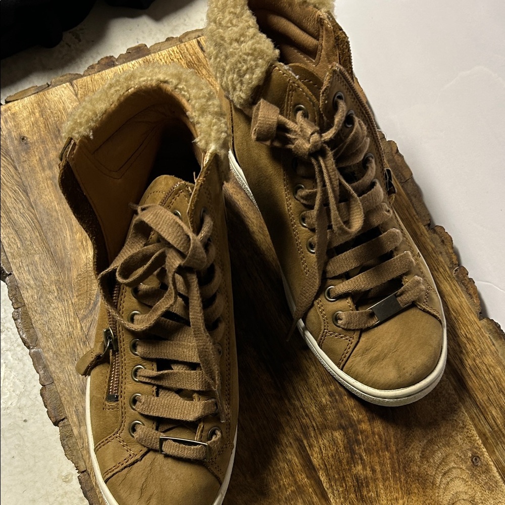 UGG Brown High-Top Sneakers with Fur Lining/side zippers.